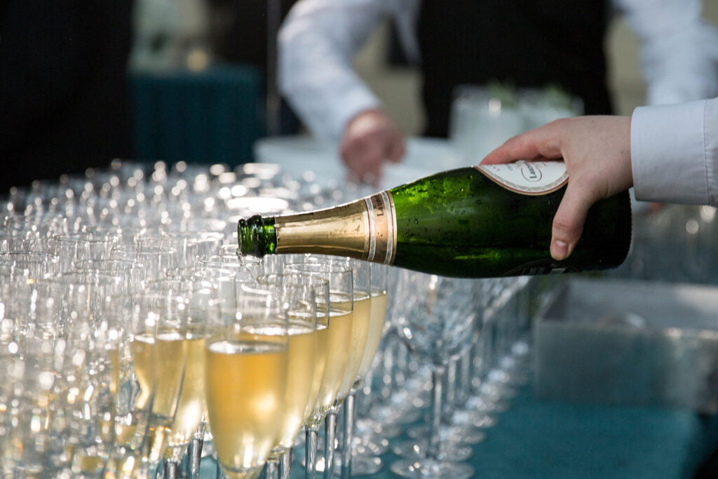 pouring champagne