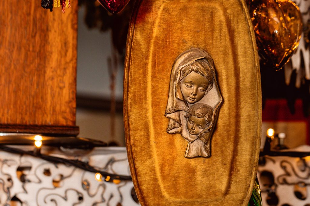 A wall plaque of the Madonna and Child