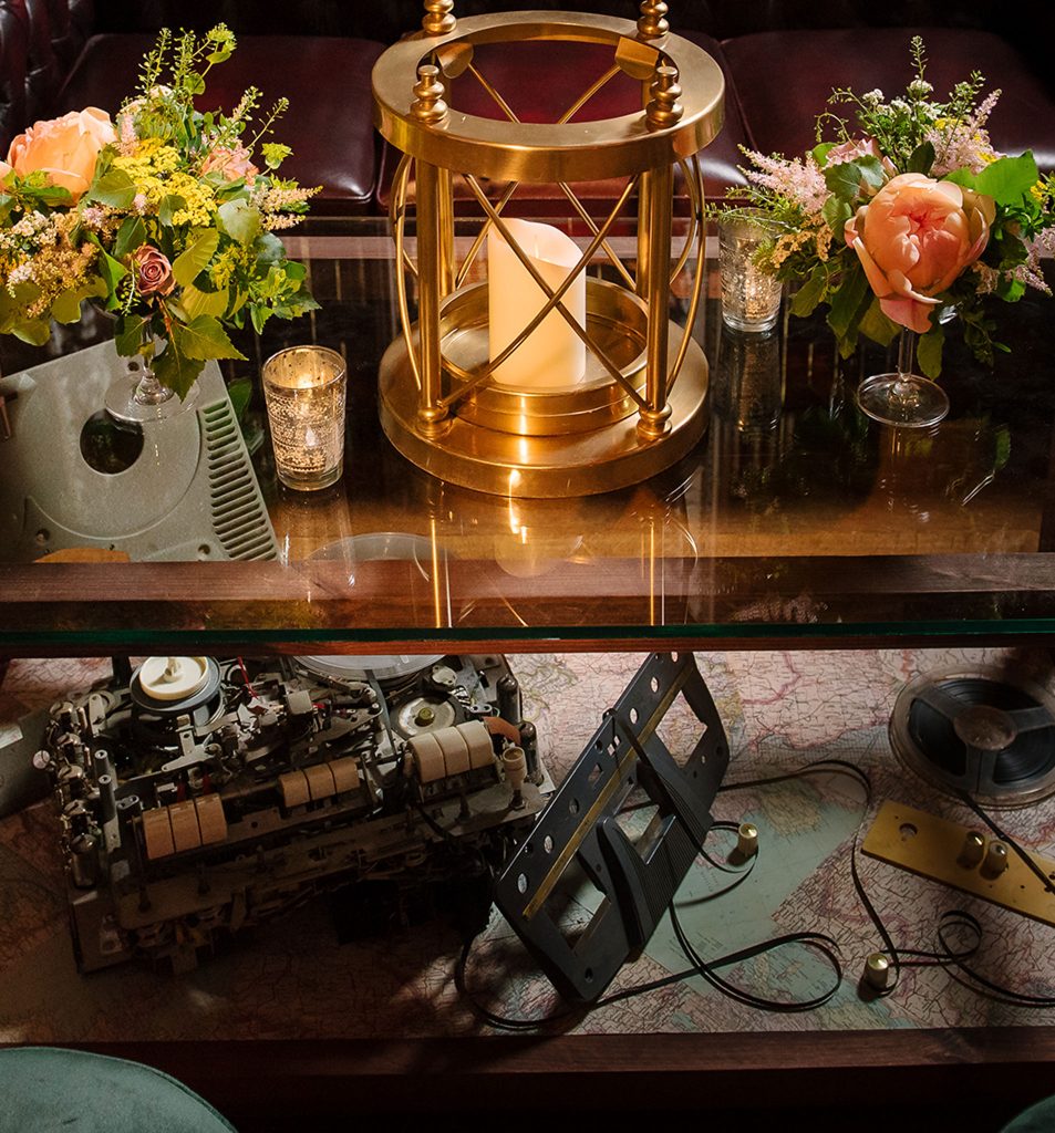 A coffee table with an old morse code machine.