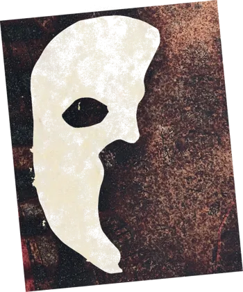 A white half-mask on a dark ground