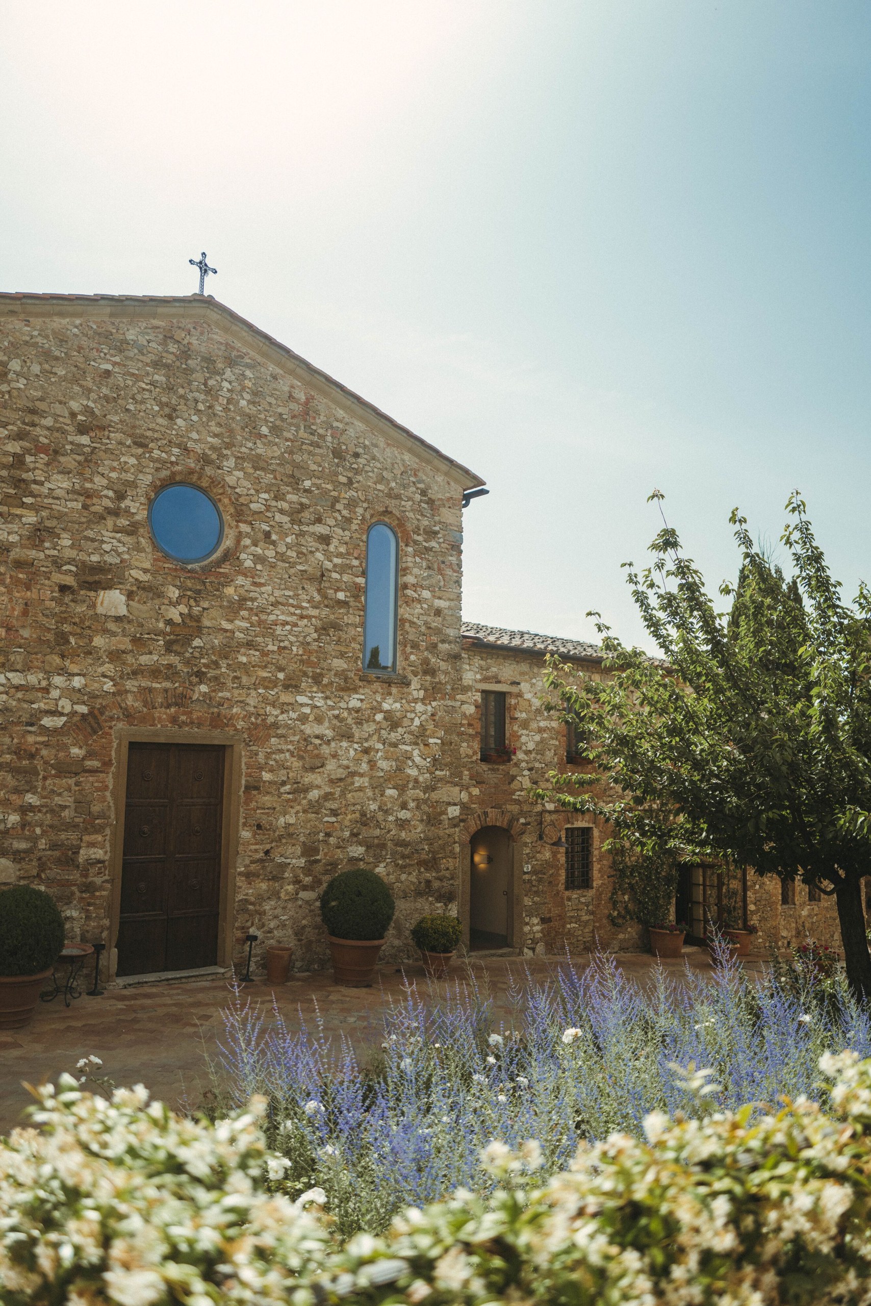 The chapel courtyard at Castello di Casole.